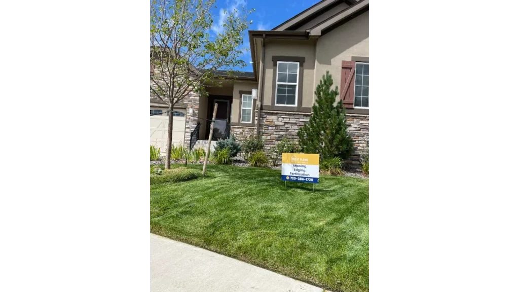 Great Plains Home Services yard sign on a freshly mowed lawn with clean stripes in Timnath.